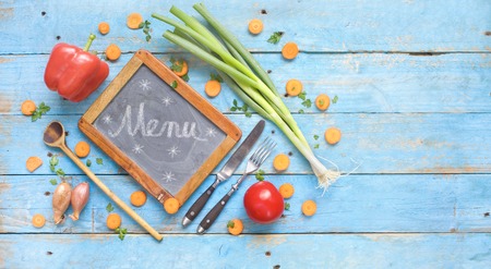 food ingredients and chalkboard for menu or recipes, free copy space, flat layの写真素材