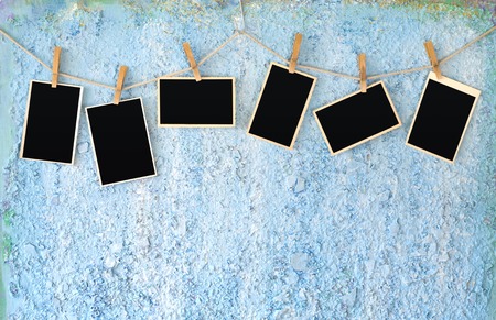 old empty frames, vintage pictures on grungy background with free space for pictures or other content.の写真素材
