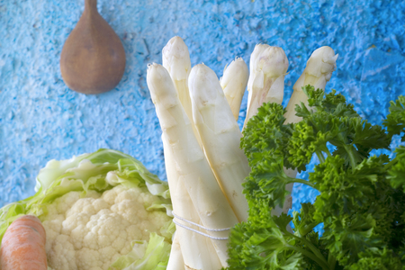 bundle of white asparagus and vegetables selective focus, close-upの写真素材