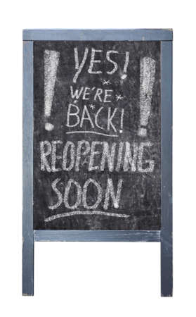 Restaurant or cafe display announcing reopening business after the corona lockdown, with the message yes we're back, isolated on whiteの写真素材