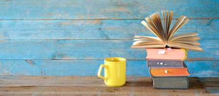 Open book, cup of coffee, panorama, reading, learning, education, good copy spaceの写真素材