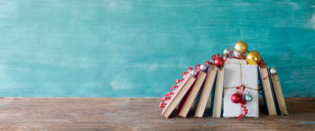 books as christmas gift, christmas present, reading, literature, education, making a gift concept