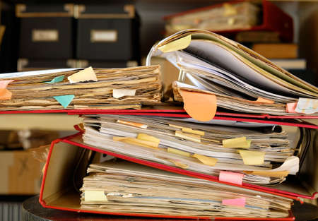 messy old file folders and documents, government, business and administration shut down in times of...