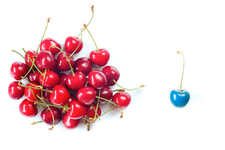 Business metaphor,solution,innovation,idea,consulting, bunch of cherrys with one cherry blue...