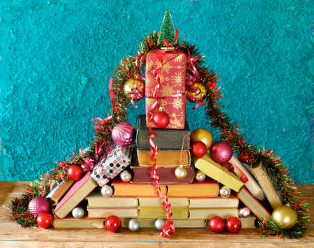 books as christmas gift,christmas present,reading,literature,education,making a gift concept, copy spaceの写真素材