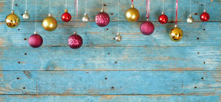 Hanging christmas balls and shabby chic painted background,christmas decoration mock up free copy spaceの写真素材