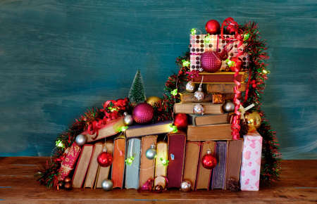 Giving books for christmas with christmas decoration.Reading,literature,education,gift,present,christian holiday concept, copy spaceの写真素材