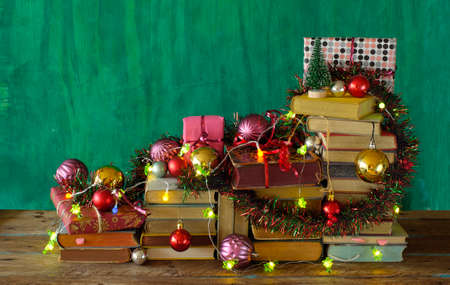 Giving books for christmas with christmas decoration.Reading, literature, education, gift, present, christian holiday concept, copy spaceの写真素材