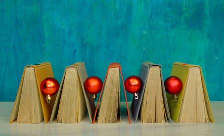 Giving books for christmas with christmas decoration.Reading, literature, education, gift, present,...