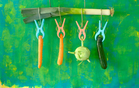 Flat lay with fresh cauliflower, wooden spoons and carrots.Healthy eating, dieting, vegan food...