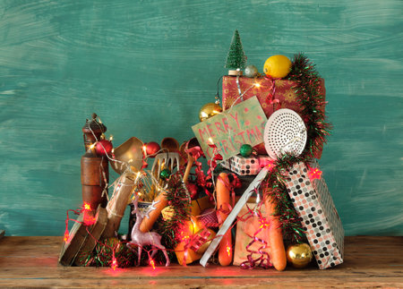 cookbooks and recipe books as christmas gift,cooking,culinary,food,reading,literature,christmas,holiday concept.Festive decoration and cooking toolsの写真素材