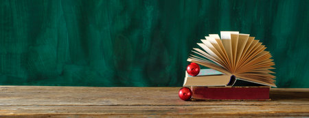 Books as christmas gift,christmas present,reading,literature,education, holiday concept.Open book...
