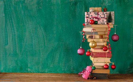 stack of books as christmas gift,christmas present,reading,literature,education,holiday concept, copy spaceの写真素材