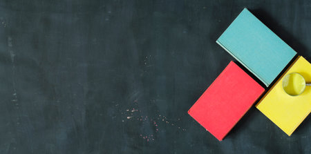 books and a magnifying glass,education,reading,knowledge, home office concept, modern art inspired flat lay.Panoramic, large copy space.の写真素材