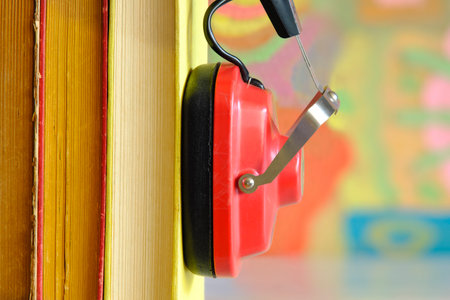 audio book concept with row of books and vintage headphones,close up free copy space