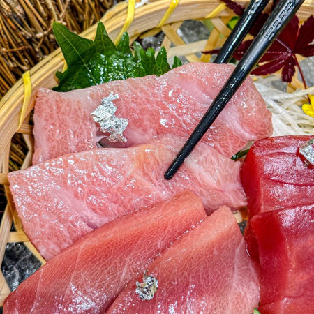 Raw fresh tuna fish sashimi in bamboo basket, Japanese foodの写真素材