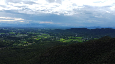 View from the top of the mountain to the valley and the cityの写真素材