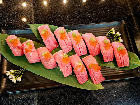 Sushi on a plate in a restaurantの写真素材