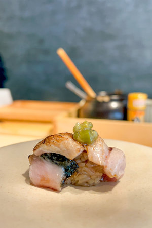 Close up of japanese sushi on a plate in a restaurantの写真素材