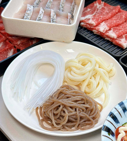 japanese food, sashimi and udon noodles on plate