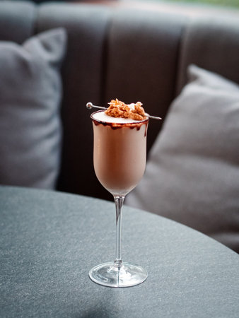 chocolate mousse with whipped cream and chocolate chips in a glassの写真素材