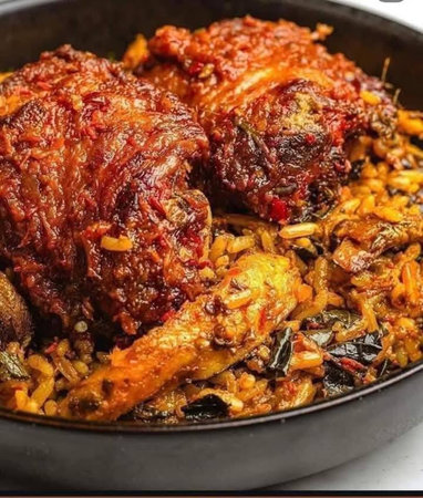 Crispy pork knuckle with rice and vegetables in a panの写真素材