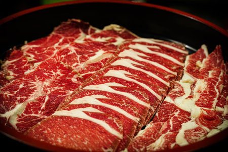 Raw fresh beef sliced for Sukiyaki japanese foodの写真素材