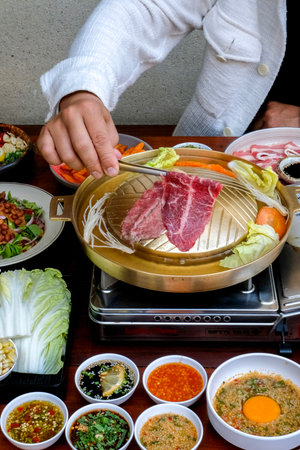Sukiyaki is a japanese hot pot with beef and vegetablesの写真素材
