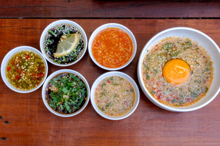Selection of Thai Spicy Food with Spicy Sauce and Eggの写真素材