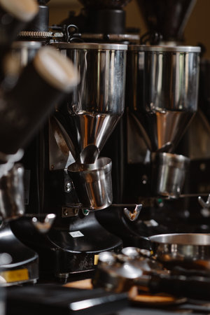 Coffee machine making espresso in coffee shop, shallow depth of fieldの写真素材