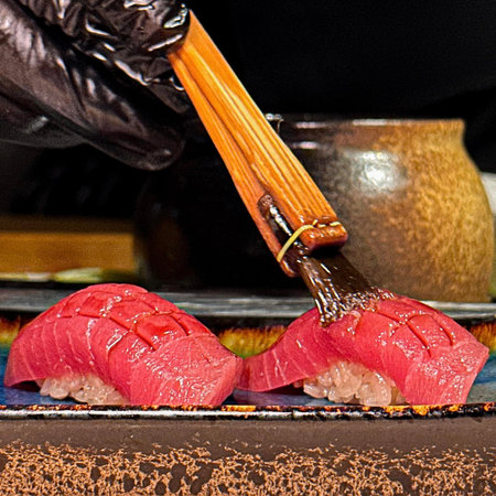 Sushi in a restaurant, Japanese food, close-up.の写真素材