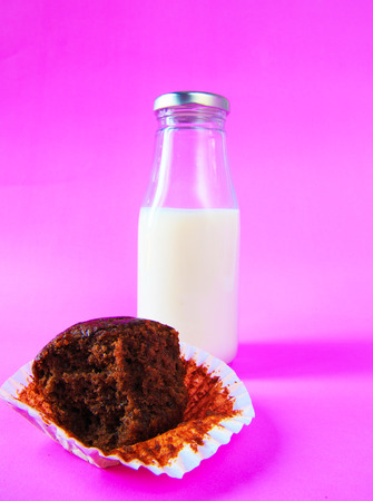Banana cake with milk bottle on purple backgroundの写真素材
