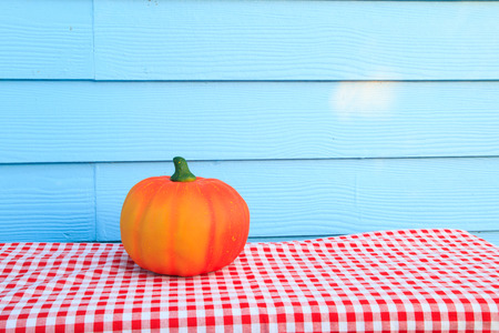 halloween pumkin on blue backgroundの写真素材
