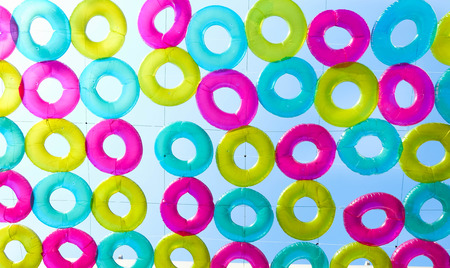 ring swimming with blue skyの写真素材