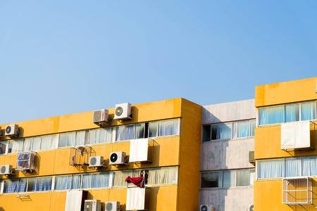 colorful residential apartments with blue skyのeditorial素材