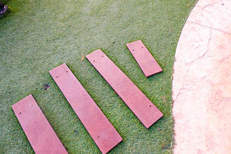 The stairs are made of wood in the garden.の写真素材