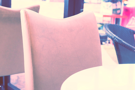 Wooden round table and chair in cafe.の写真素材