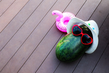 watermelon fruit in heart sunglasses in summer.の写真素材
