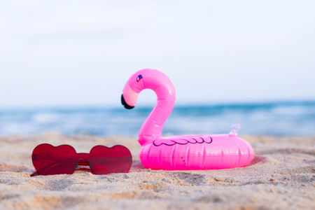 Sunglasses on the beach in summer ,sea background.の写真素材