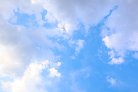 Blue sky background with clouds.の写真素材
