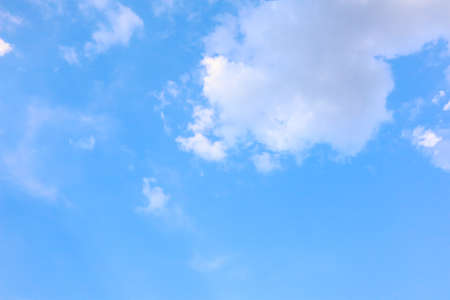 Blue sky background with clouds.の写真素材