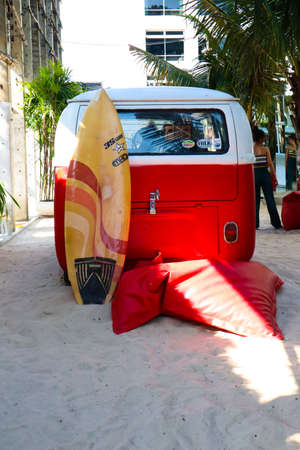 20 May 2020; Bangkok Thailand: Vintage car with a surfboard on the sandy beach.の写真素材