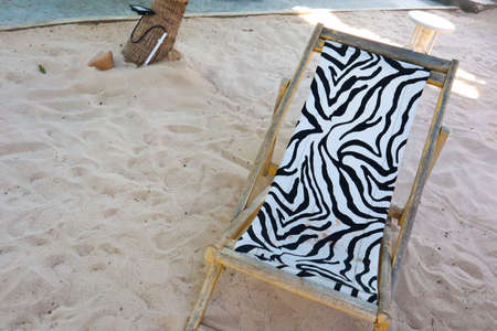 Beach chairs on the sandy beach.の写真素材