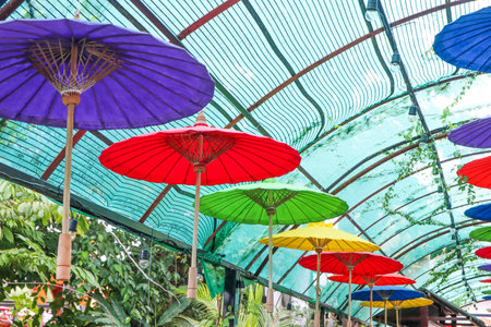 Chiangmai - THAILAND , December 1,2021 : Colorful handmade umbrellas at Chiangmai ,lanna style.の写真素材