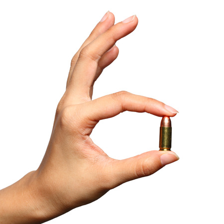  Bullet in Woman Hand,Isolated on White backgroundの写真素材