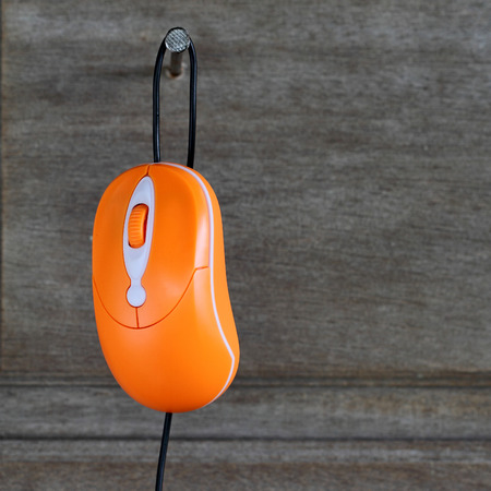 computer mouse on old wood の写真素材