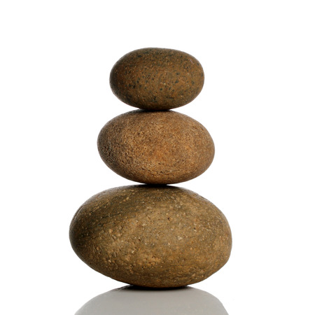 stone pyramid over whiteの写真素材