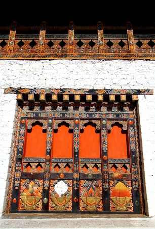 Local unique architectural details of wooden door in Bhutan.の写真素材