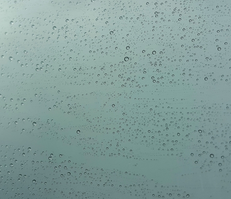 Drops of rain on glass