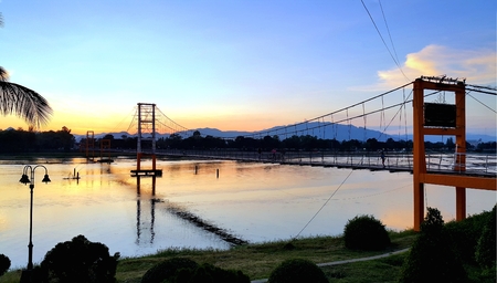 Tak, Thailand, Nov05, 2015 : 200 year Rattanakosin Sompoch bridge (hanging bridge) across the ping...